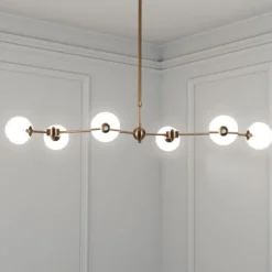 Alycia a clear lampadario acciaio verniciato ottone anticato opaco sfere in vetro trasparente cm 120 x 68 h90