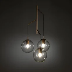 Alycia e lampadario in acciaio oro opaco e 3 sfere in vetro trasparente 115x10xh95-132 cm