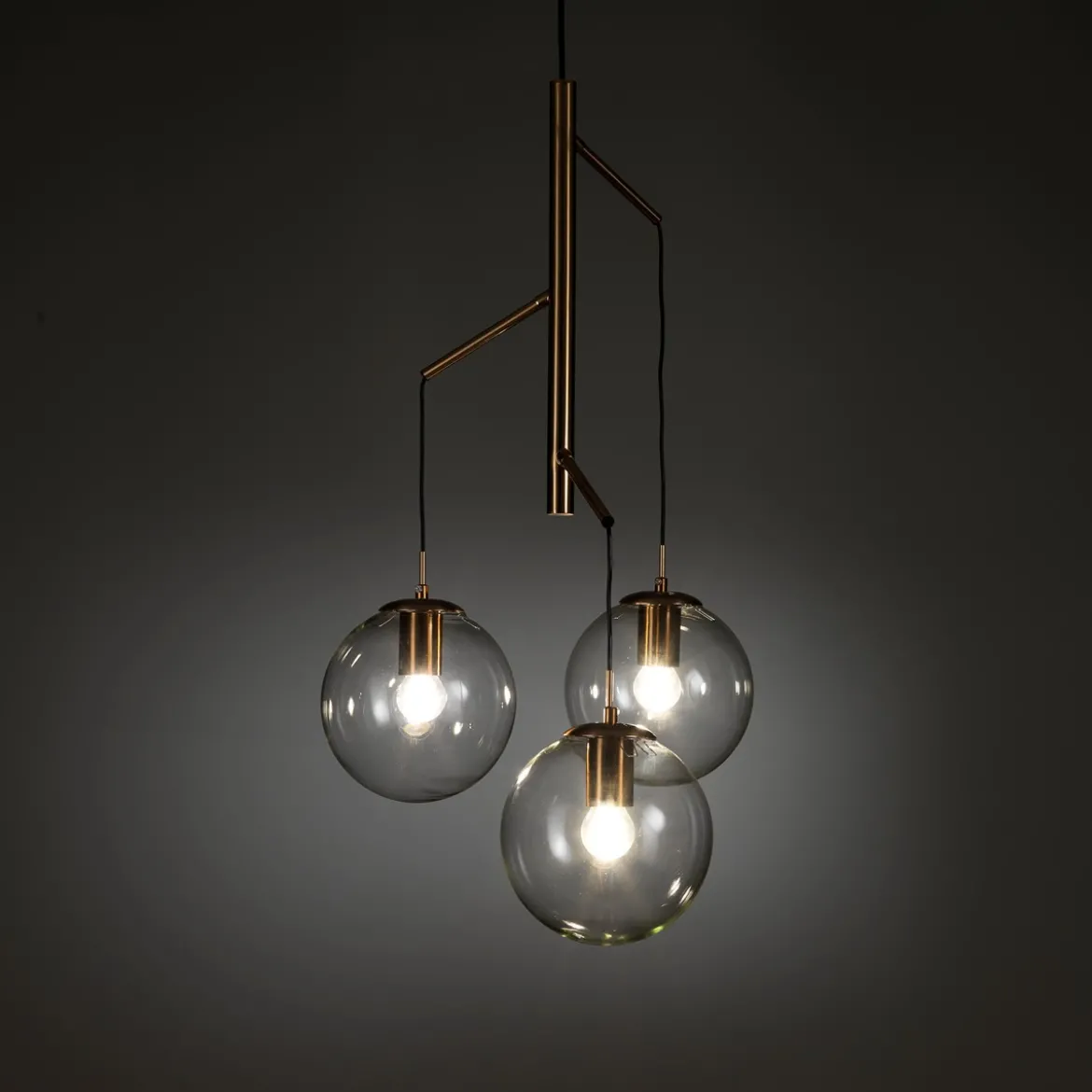 Alycia e lampadario in acciaio oro opaco e 3 sfere in vetro trasparente 115x10xh95-132 cm
